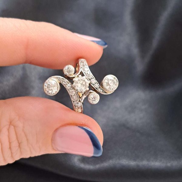 Victorian Antique Old Cut Diamond Ring, central old cut diamond set within curved diamond-set shoulders with larger diamond accents