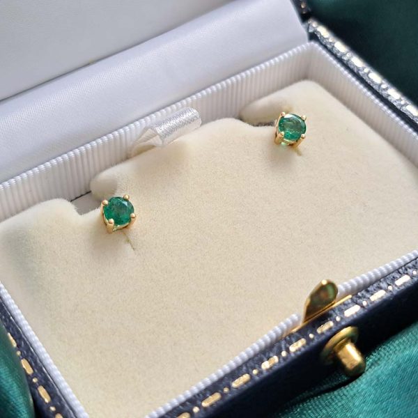0.70ct Emerald Solitaire Stud Earrings in 18ct Gold, single stone round emeralds claw set and mounted in 18ct yellow gold with post and butterfly fittings