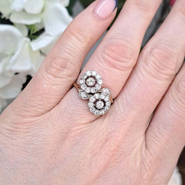 Victorian Antique Diamond Double Floral Cluster Ring, composed of two diamond flower clusters set with sparkling old-cut diamonds in 18ct yellow gold