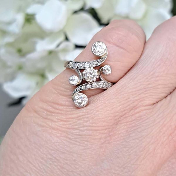 Victorian Antique Old Cut Diamond Ring, central old cut diamond set within curved diamond-set shoulders with larger diamond accents