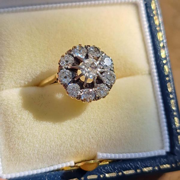 Victorian Antique Old Cut Diamond Cluster Engagement Ring, set with old mine-cut diamonds in 18ct yellow gold