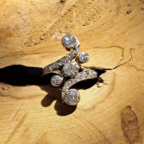 Victorian Antique Old Cut Diamond Ring, central old cut diamond set within curved diamond-set shoulders with larger diamond accents