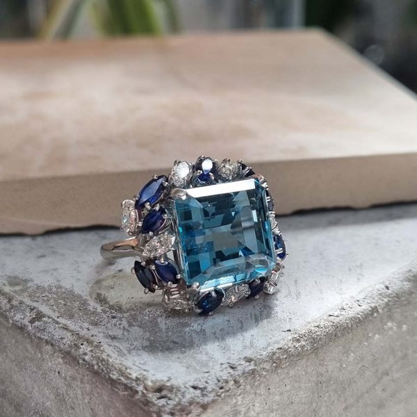 Vintage 12ct Aquamarine with Marquise Diamond and Sapphire Cluster Cocktail Ring in iridium and platinum. Circa 1960s
