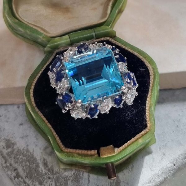 Vintage 12ct Aquamarine with Marquise Diamond and Sapphire Cluster Cocktail Ring in iridium and platinum. Circa 1960s