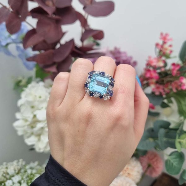 Vintage 12ct Aquamarine with Marquise Diamond and Sapphire Cluster Cocktail Ring in iridium and platinum. Circa 1960s