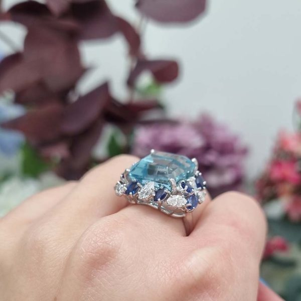 Vintage 12ct Aquamarine with Marquise Diamond and Sapphire Cluster Cocktail Ring in iridium and platinum. Circa 1960s