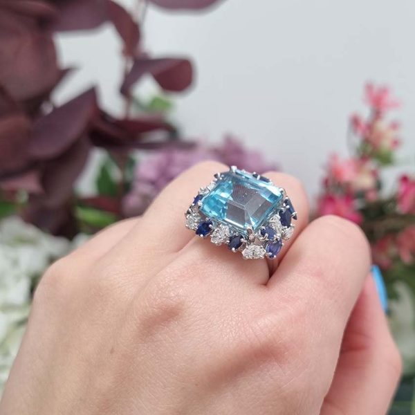 Vintage 12ct Aquamarine with Marquise Diamond and Sapphire Cluster Cocktail Ring in iridium and platinum. Circa 1960s
