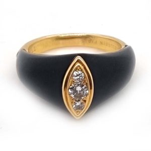 Vintage French Mauboussin Black Enamel and Diamond Ring, Signed and numbered, three sparkling diamonds in a navette/marquise shaped setting atop a domed black enamel mount in 18ct yellow gold