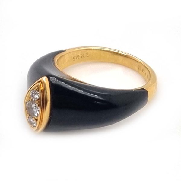 Vintage French Mauboussin Black Enamel and Diamond Ring, Signed and numbered, three sparkling diamonds in a navette/marquise shaped setting atop a domed black enamel mount in 18ct yellow gold