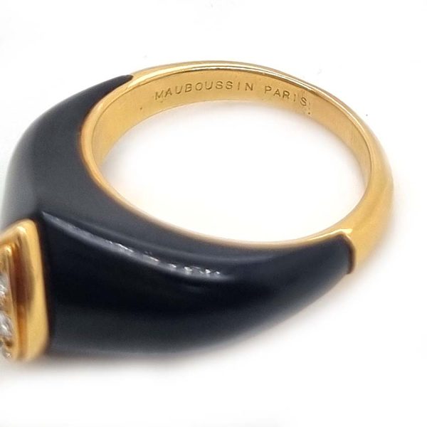 Vintage French Mauboussin Black Enamel and Diamond Ring, Signed and numbered, three sparkling diamonds in a navette/marquise shaped setting atop a domed black enamel mount in 18ct yellow gold