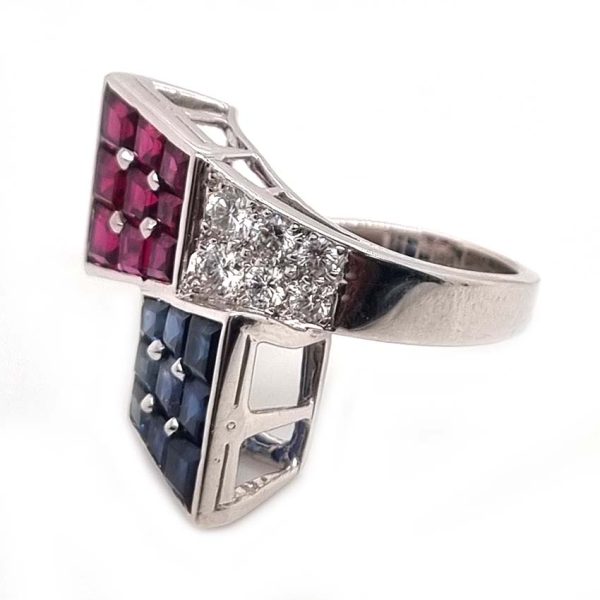 Oscar Heyman Ruby Sapphire Diamond Cocktail Statement Ring, Square cut sapphires and rubies are invisibly set into heads which lead to diamond-set crossover shoulders in 18ct white gold