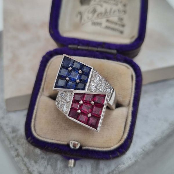 Oscar Heyman Ruby Sapphire Diamond Cocktail Statement Ring, Square cut sapphires and rubies are invisibly set into heads which lead to diamond-set crossover shoulders in 18ct white gold