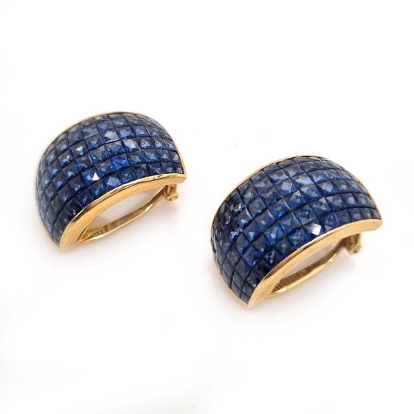 Vintage French Square Cut Sapphire Half Hoop Earrings, 18ct yellow gold half hoop earrings are invisibly set with 156 square French cut sapphires with articulated post and clip fitting. Circa 1980s