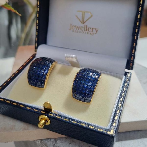 Vintage French Square Cut Sapphire Half Hoop Earrings, 18ct yellow gold half hoop earrings are invisibly set with 156 square French cut sapphires with articulated post and clip fitting. Circa 1980s