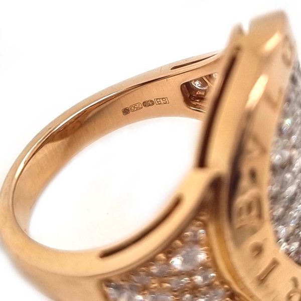 Bvlgari Pave Diamond Oval Panel Statement Ring in 18ct Rose Gold, central curved oval panel section pave-set with sparkling diamonds encased within gold border engraved with the iconic BVLGARI BVLGARI