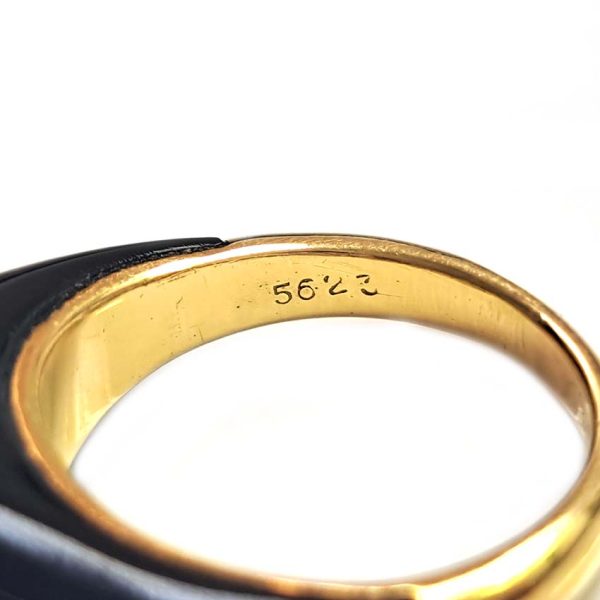 Vintage French Mauboussin Black Enamel and Diamond Ring, Signed and numbered, three sparkling diamonds in a navette/marquise shaped setting atop a domed black enamel mount in 18ct yellow gold