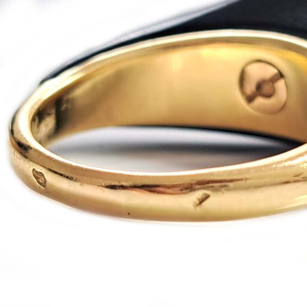 Vintage French Mauboussin Black Enamel and Diamond Ring, Signed and numbered, three sparkling diamonds in a navette/marquise shaped setting atop a domed black enamel mount in 18ct yellow gold