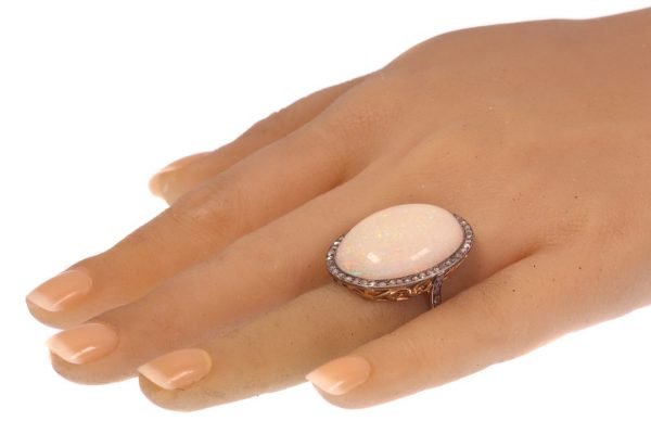 Vintage opal and diamond ring in gold and silver.
