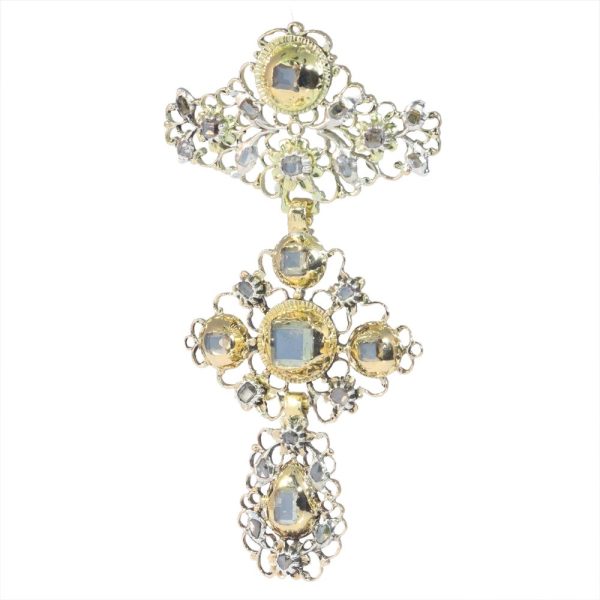 Baroque diamond pendant in gold and silver.