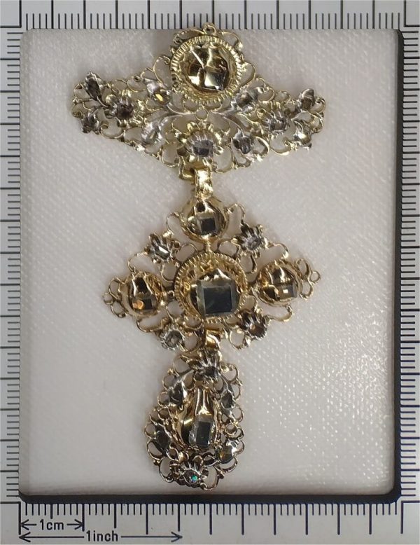 Baroque diamond pendant in gold and silver.