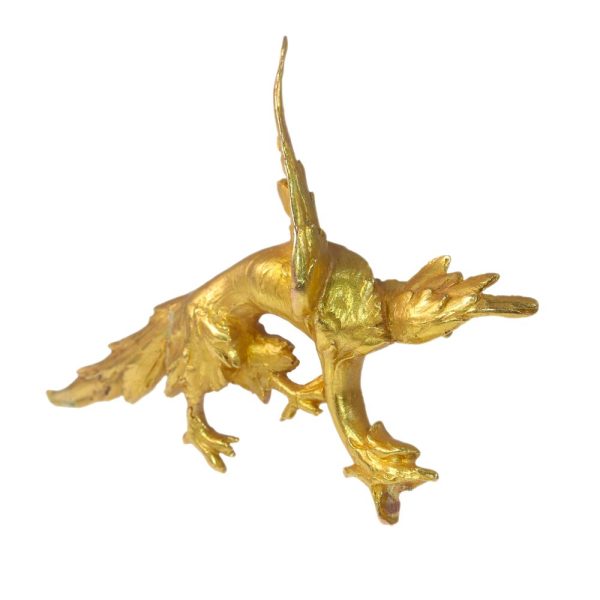 Antique gold griffin brooch.