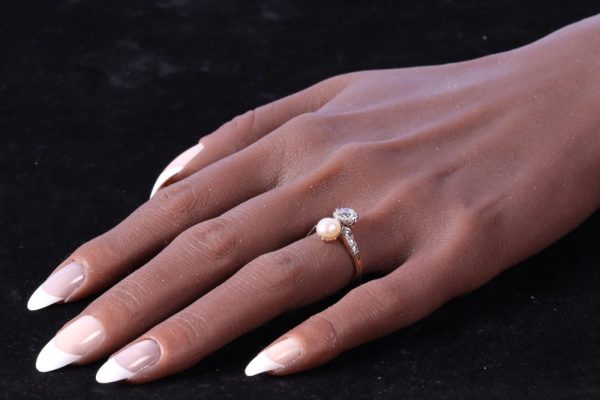 Victorian diamond and pearl engagement ring in platinum and gold.