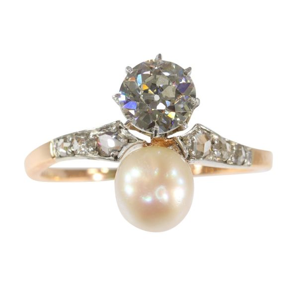 Victorian diamond and pearl engagement ring in platinum and gold.