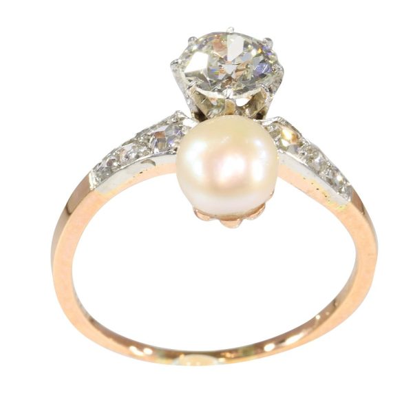 Victorian diamond and pearl engagement ring in platinum and gold.