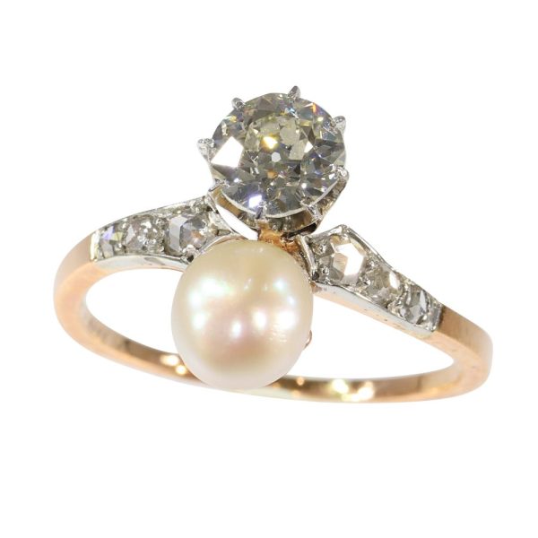 Victorian diamond and pearl engagement ring in platinum and gold.