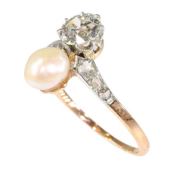 Victorian diamond and pearl engagement ring in platinum and gold.