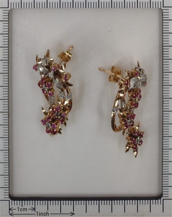 Vintage diamond and ruby earrings in gold.