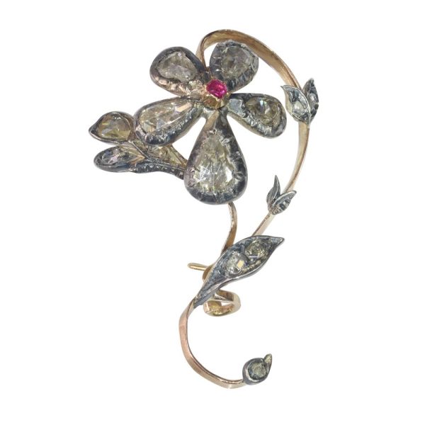 Victorian diamond and ruby brooch in gold and silver.