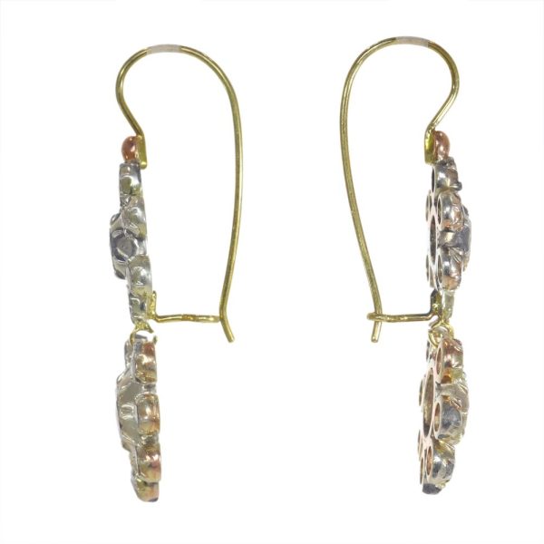 Victorian diamond drop earrings in silver and rose gold.
