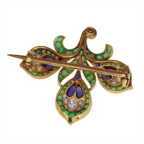 Antique diamond, sapphire and emerald brooch in gold.