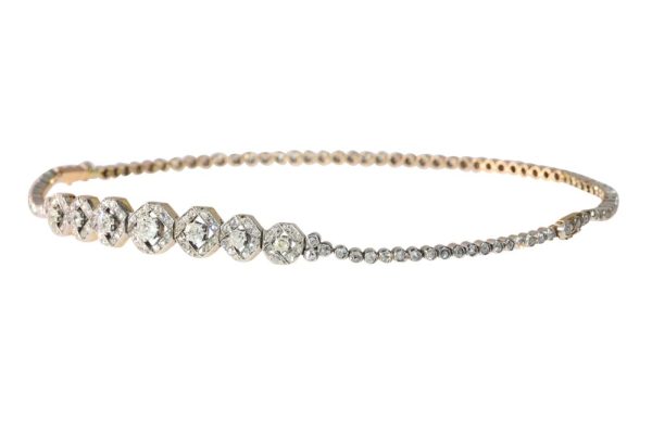 Victorian diamond bracelets that transform into necklace in gold and silver.