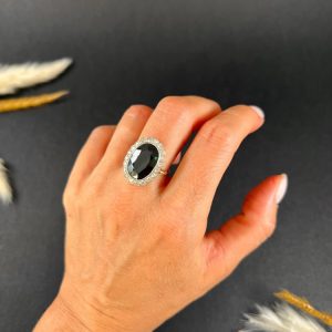 Antique sapphire and diamond cluster ring in gold and platinum.