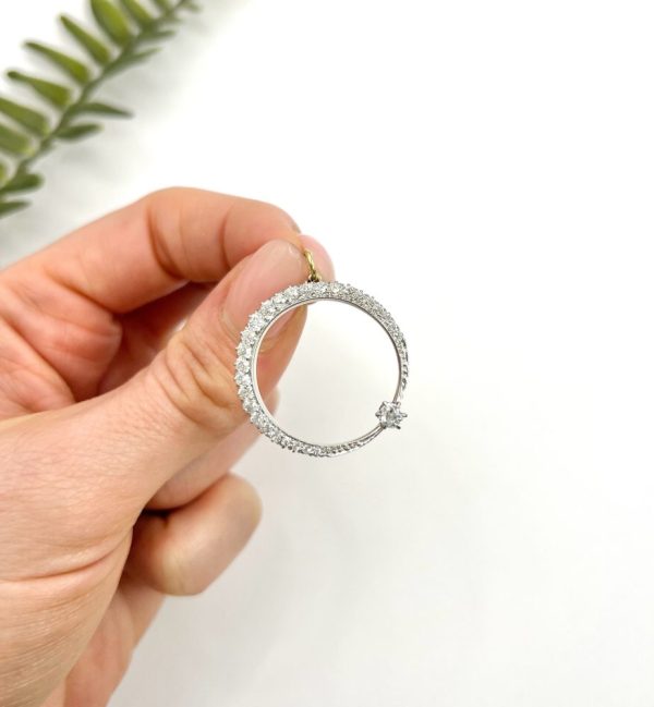 Edwardian diamond crescent moon pendant in white gold.