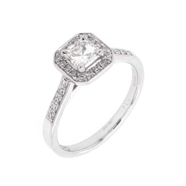 Asscher cut diamond cluster ring in platinum.