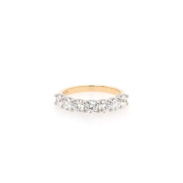 Diamond half eternity ring in gold and platinum.
