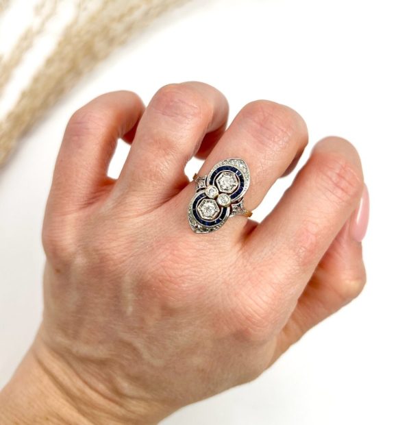 Art Deco diamond and sapphire ring in platinum and gold.