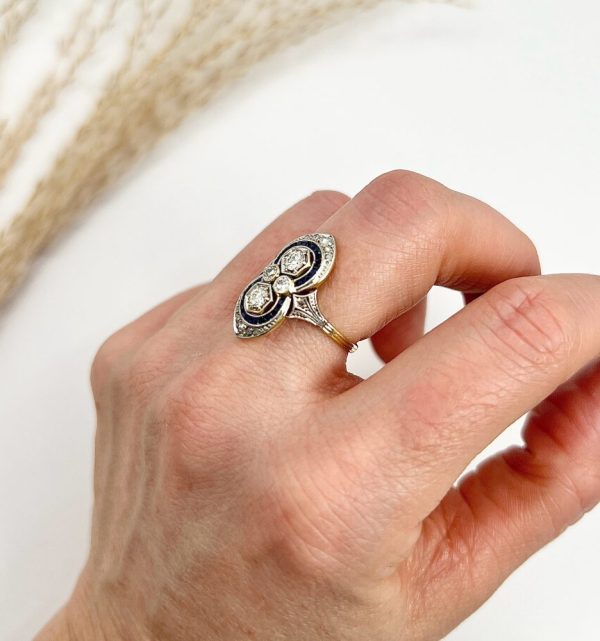 Art Deco diamond and sapphire ring in platinum and gold.