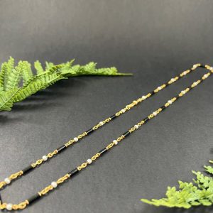 Victorian enamel and pearl long necklace in gold,.