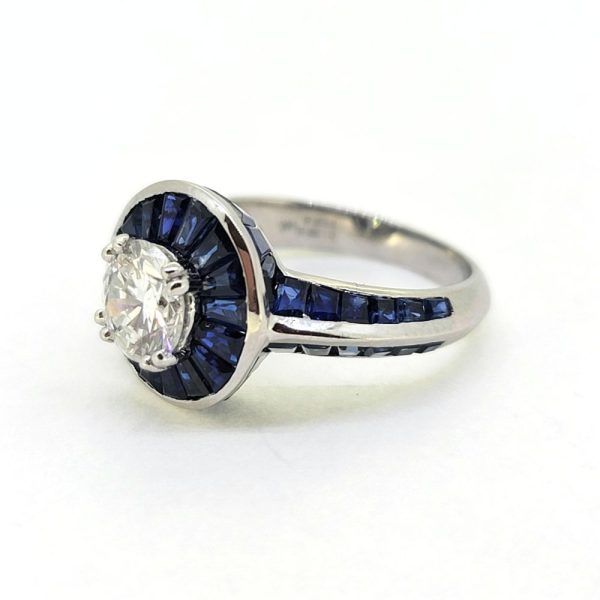 1ct Old Cut Diamond and Sapphire Target Cluster Engagement Ring, 1.01ct old-cut diamond surrounded by halo of tapered baguette cut sapphires in 18ct white gold