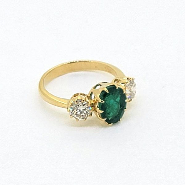 2.32ct Oval Emerald and 1ct Diamond Three Stone Trilogy Engagement Ring in 18ct Yellow Gold