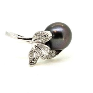 Contemporary Tahitian Pearl and Diamond Dress Ring, 13mm grey Tahitian pearl nestled within a diamond set leaf design mount in 18ct white gold