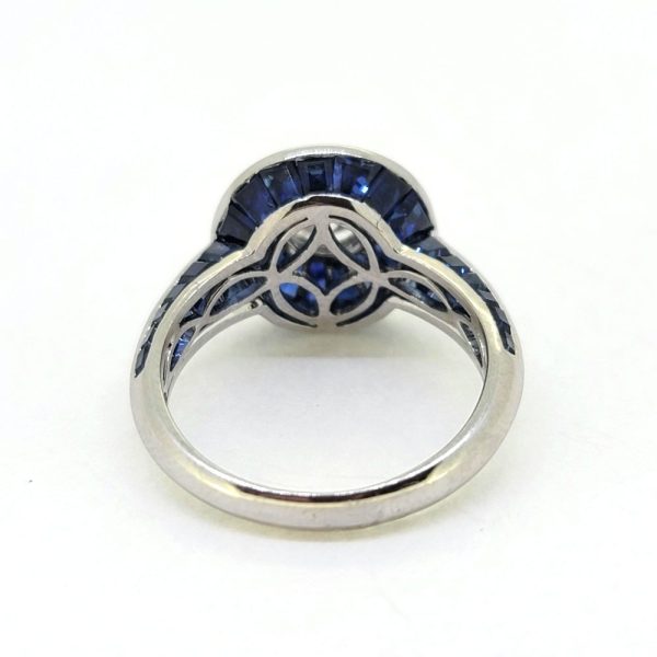 1ct Old Cut Diamond and Sapphire Target Cluster Engagement Ring, 1.01ct old-cut diamond surrounded by halo of tapered baguette cut sapphires in 18ct white gold