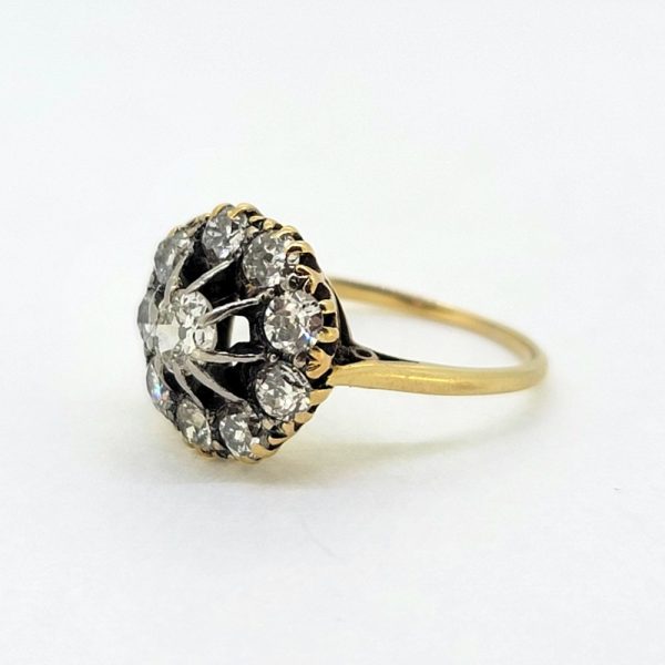 Victorian Antique Old Cut Diamond Cluster Engagement Ring, set with old mine-cut diamonds in 18ct yellow gold