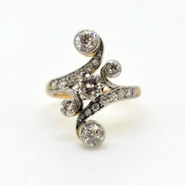 Victorian Antique Old Cut Diamond Ring, central old cut diamond set within curved diamond-set shoulders with larger diamond accents