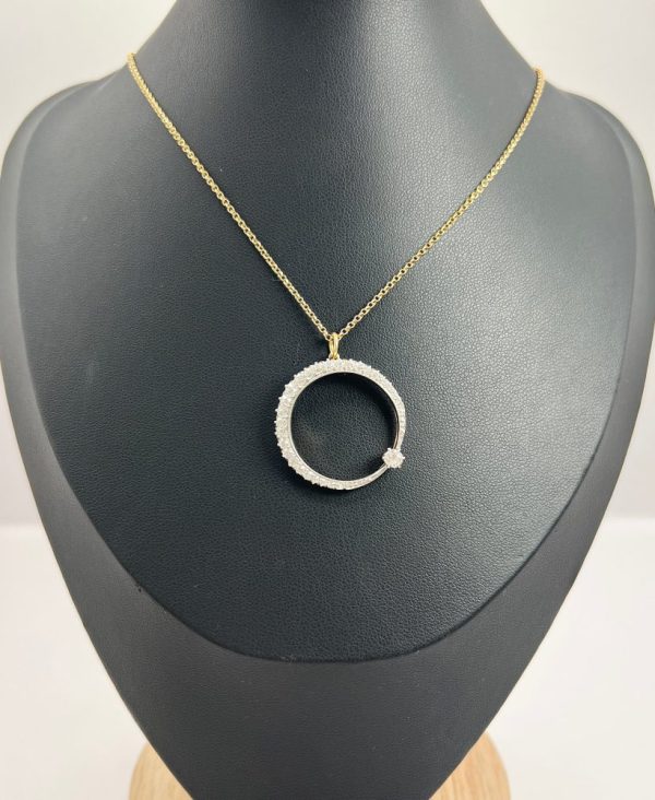 Edwardian diamond crescent moon pendant in white gold.