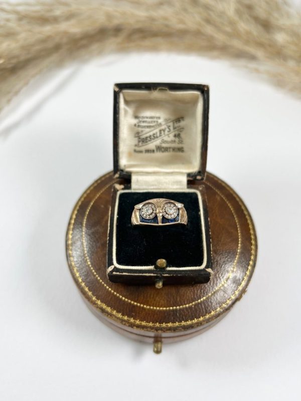 Vintage owl cocktail ring in rose gold with diamonds and sapphires.